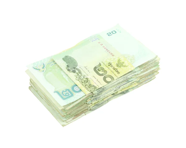 Pila de dinero tailandés sobre fondo blanco — Foto de Stock