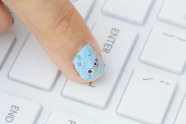 Finger pushing the enter button of keyboard — Stock Photo, Image