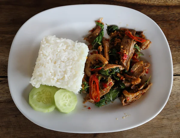 Fried pork with sweet basi and white jasmine sticky rice — Stock Photo, Image