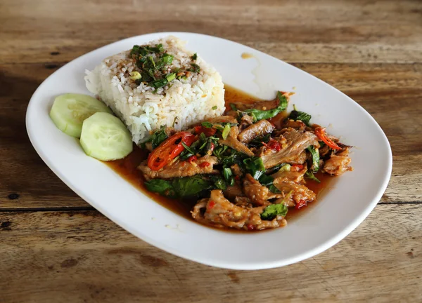 Fried pork with sweet basi and white jasmine sticky rice — Stock Photo, Image