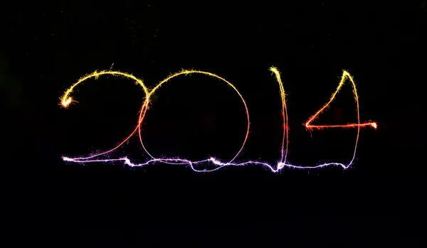 2014 escrito en letras brillantes —  Fotos de Stock