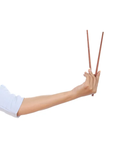 Chopsticks in a hand — Stock Photo, Image