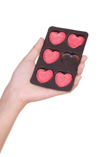 Serca cukierki trzymając się za ręce — Zdjęcie stockowe