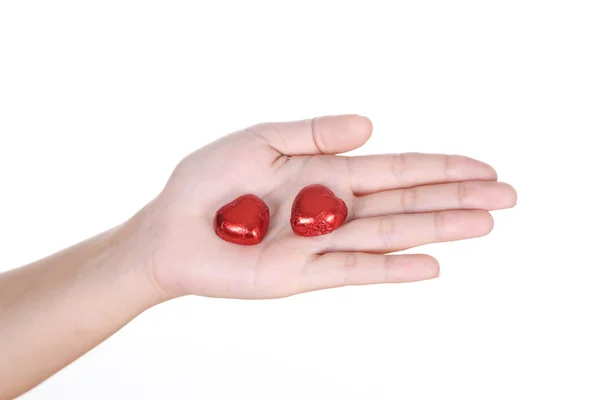 Heart chocolate on hand — Stock Photo, Image