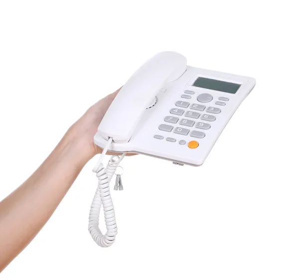 Hand holding white telephone — Stock Photo, Image