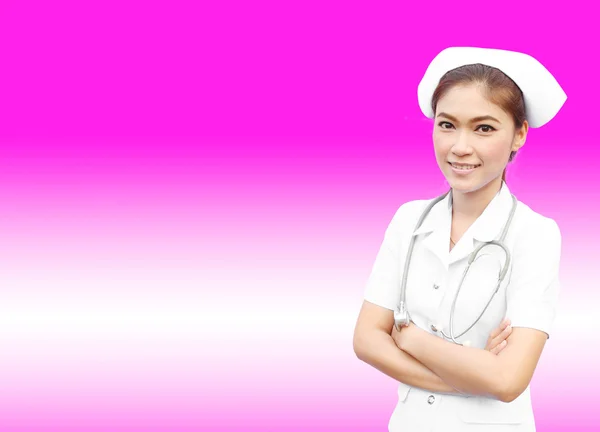Female nurse standing with stethoscope — Stock Photo, Image
