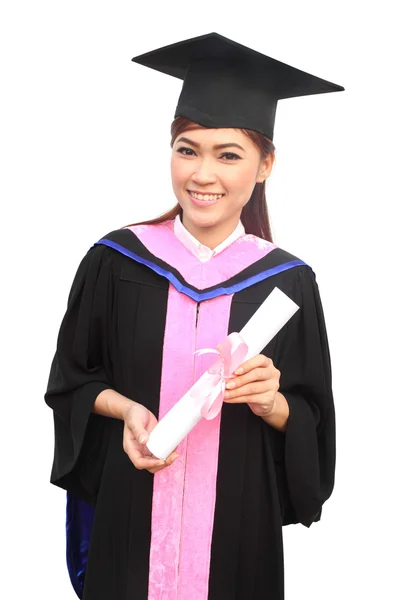 Woman with graduation cap and gown with arm raised holding diplo — Stock Photo, Image