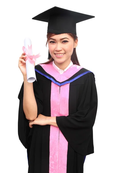 Woman with graduation cap and gown with arm raised holding diplo — Stock Photo, Image