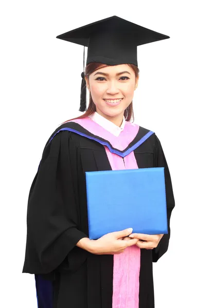 Beautiful graduation girl holding her diploma — Stock Photo, Image
