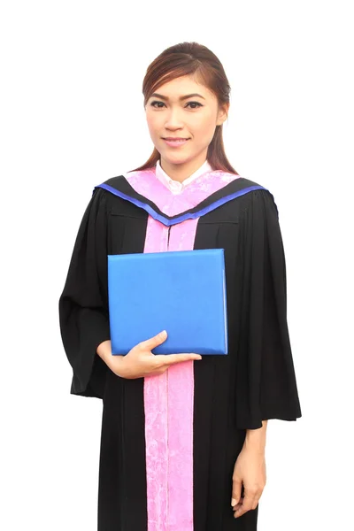 Beautiful graduation girl holding her diploma — Stock Photo, Image