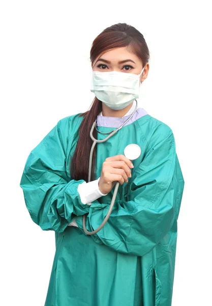 Female doctor wearing a green scrubs and stethoscope — Stock Photo, Image