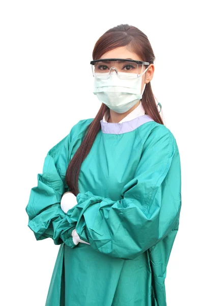 Ženský lékař, nosí zelené křoviny — Stock fotografie