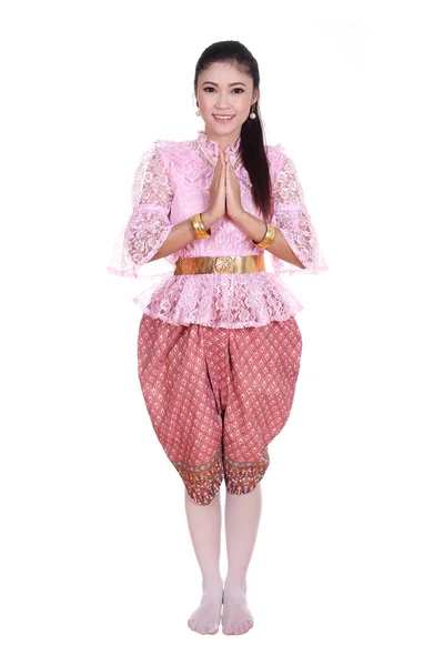 Woman wearing typical thai dress pay respect isolated on white b — Stock Photo, Image