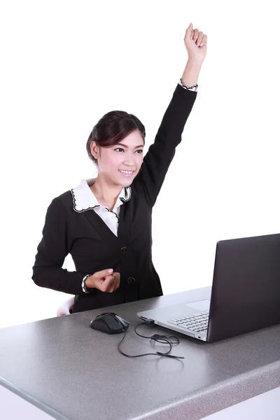 Celebrating businesswoman with laptop computer — Stock Photo, Image
