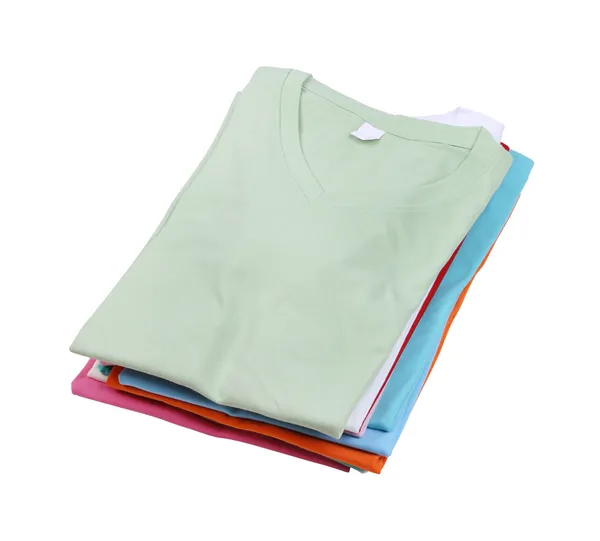 Stack av färgglada t-shirt — Stockfoto