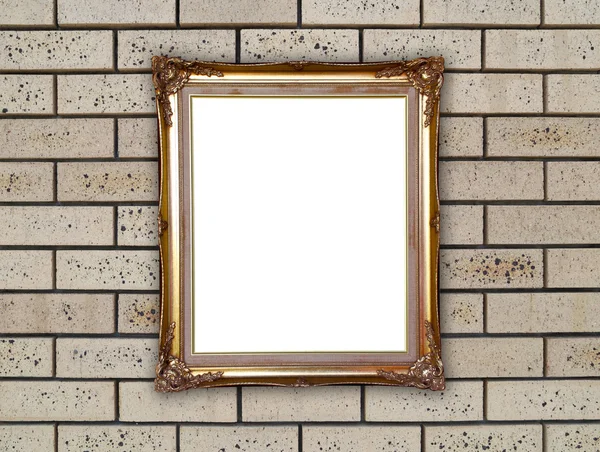 Zlatý rám na kamenné zdi — Stock fotografie