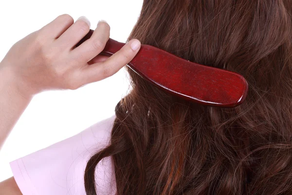 Mujer cepillándose el pelo — Foto de Stock