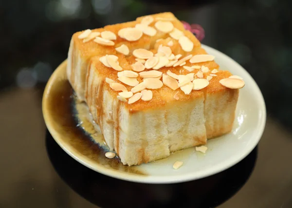 Brot mit Honig und Butter — Stockfoto