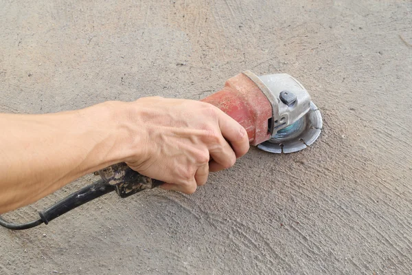 Hand with grinding tool — Stock Photo, Image