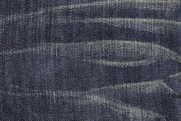 Крупним планом синя текстура джинсів — стокове фото
