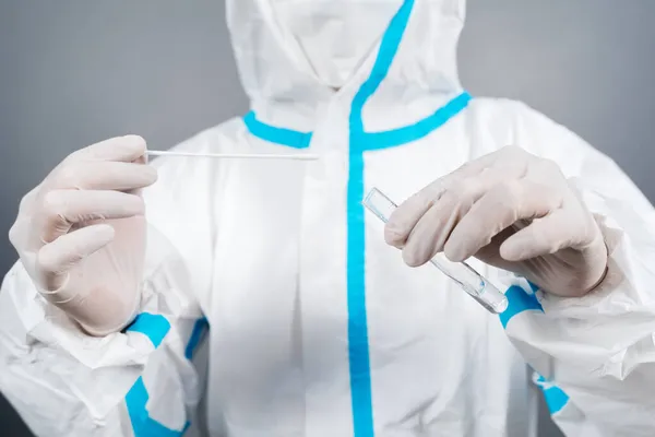 Close Doctor Protective Suit Ppe Holding Coronavirus Covid Nasal Swab — Stock Photo, Image