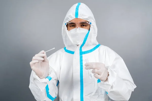 Male Doctor Protective Suit Ppe Holding Coronavirus Covid Nasal Swab — Stock Photo, Image