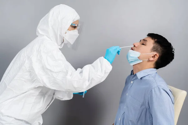 Doctor Ppe Suit Test Coronavirus Covid Young Man Nasal Swab — Stock Photo, Image