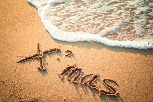 Schrijven x'mas op het strand in thailand — Stockfoto