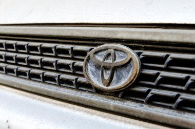 Logo of Toyota old Corolla on display.Toyota Group is best known clipart