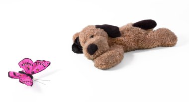 Lying Plush Dog With Silk Butterfly clipart