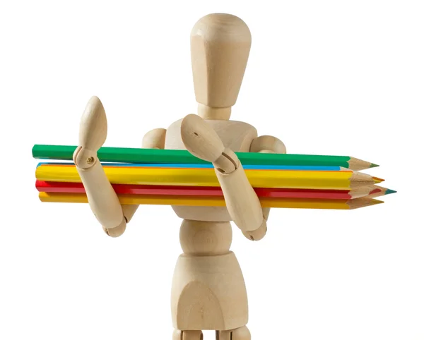 Mannequin en bois portant des crayons de couleur — Photo