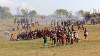 PALMANOVA, Italy - September 4, 2022: Seventeenth century's battle between the Venetian and the Austrian armies at the annual historical reenactment clipart