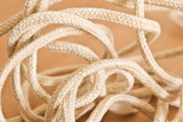 Tangled Rope Light Brown Background Selective Focus Shallow Depth Field — 图库照片