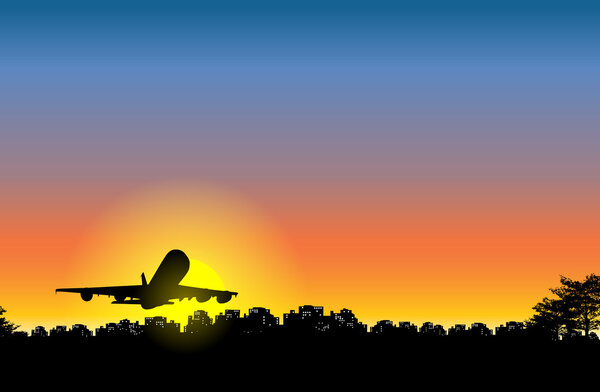 Закат самолета над городом
