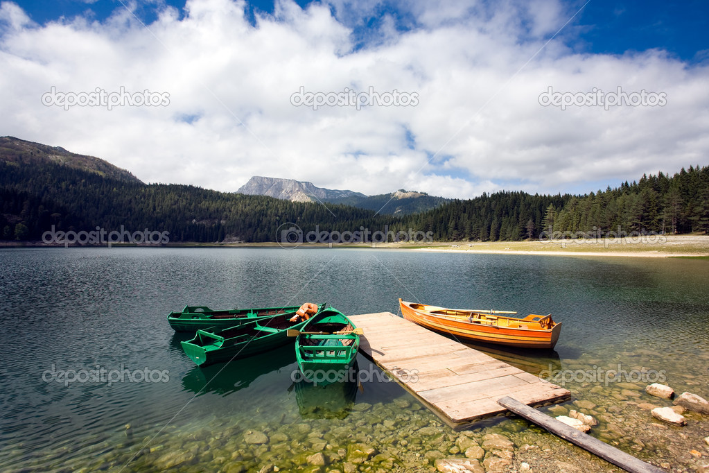 Canoes on beautiful mountain lake
