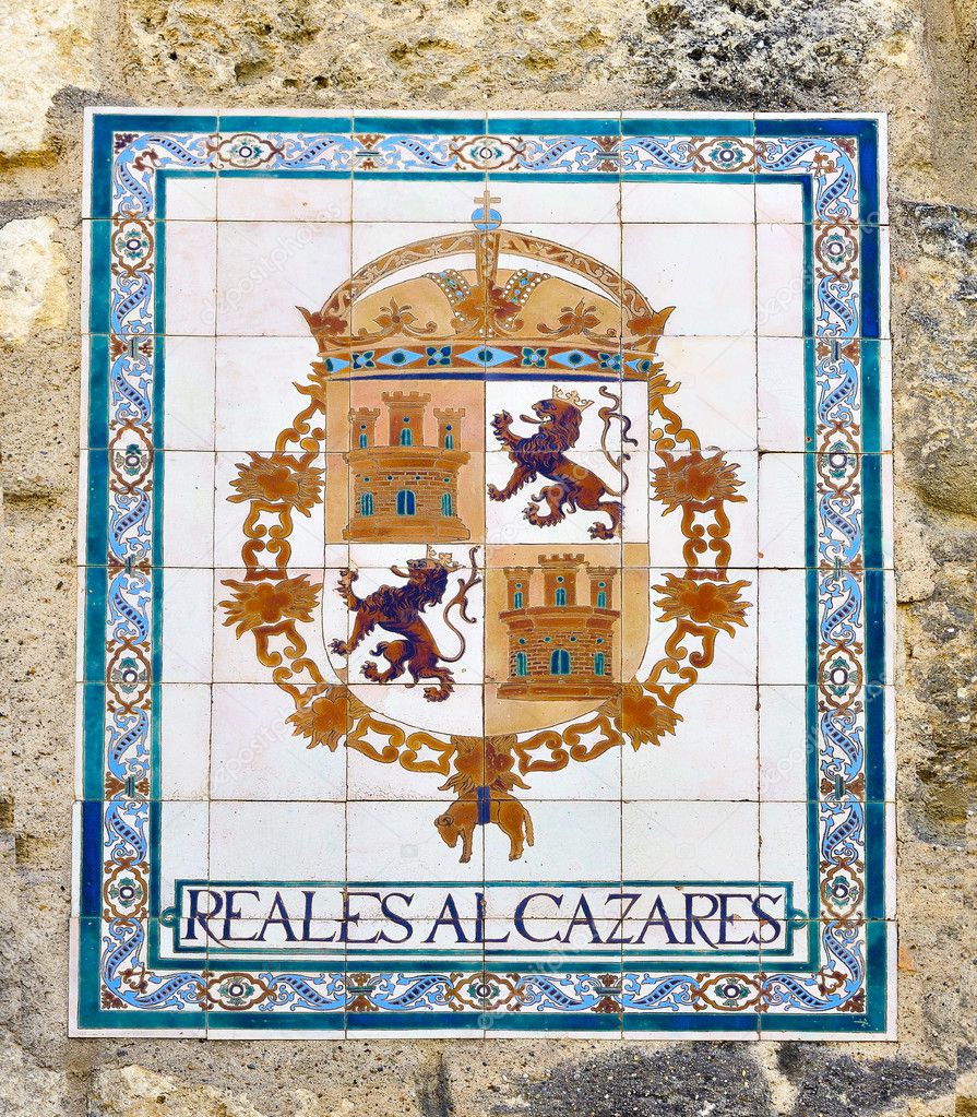 Decorative tile with royal coat of arms alcazar in Seville