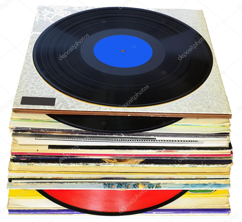 33 rpm vinyl discs stack on white background