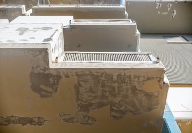 Balconies of condominium facade repaired after degradation and cracks in the reinforced concrete structure