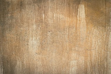 Eski kaba sarı beton duvar yüzey sanatçısı. Duvarlar ve zemin, pürüzlü ve çizik yüzeyi olan sarı beton yüzey.