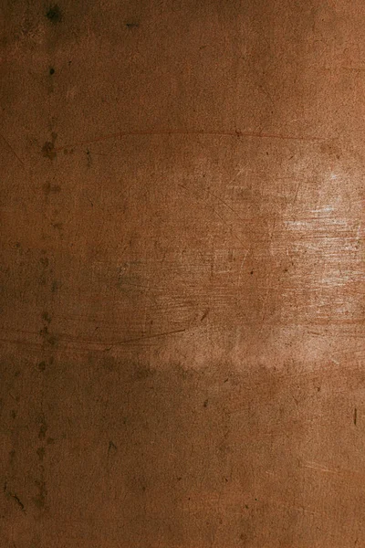 Brown wall is texture background. Light is reflection on wall. Can be used mock up for your product and free space for your text. Viroc wall texture