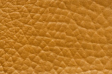 Hakiki deri dokusu arka planı. Dekorasyon için sarı desenler. Tasarım çizgisi desenli veya soyut olan klasik deri süeti, arka plan lüks etkinliğini kullanabilir