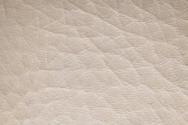 Beyaz krem yapay veya sentetik deri arka plan, düzgün doku ve kopyalama alanı, deri benzeri döşeme, moda, dikiş veya ayakkabı projelerine yönelik renkli kumaş örneği