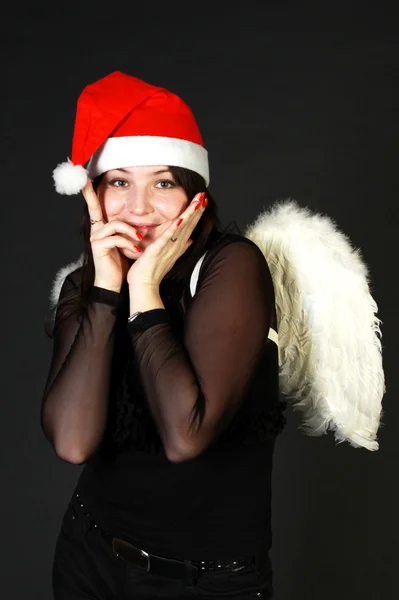 Mujer en Santa sombrero con alas —  Fotos de Stock