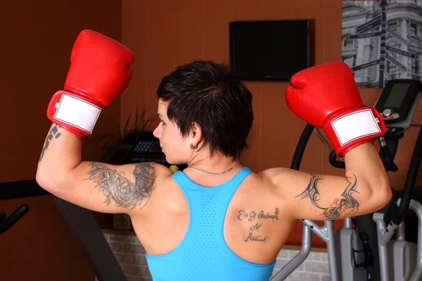 Woman in red boxing gloves — Stock Photo, Image