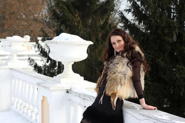 Brunette woman in fur jacket — Stock Photo, Image