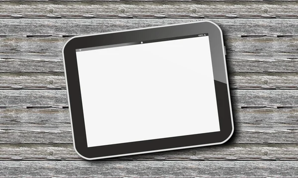 Tablet pc on weathered wooden horizontal fence — Stock Photo, Image