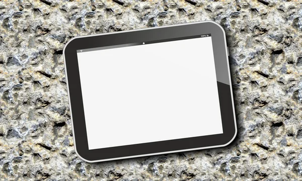 Tablet pc on volcanic rock — Stock Photo, Image