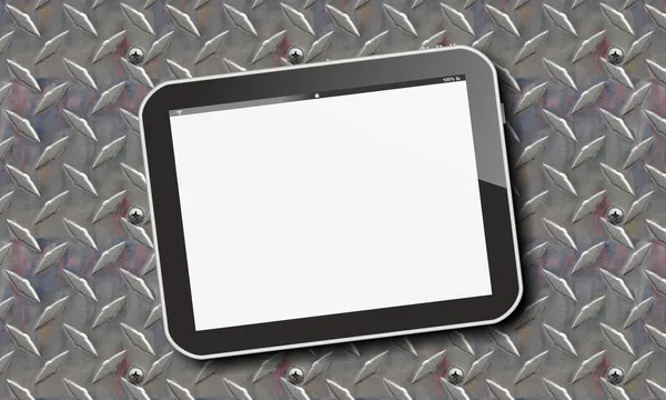 Tablet pc on brushed metal panel — Stock Photo, Image