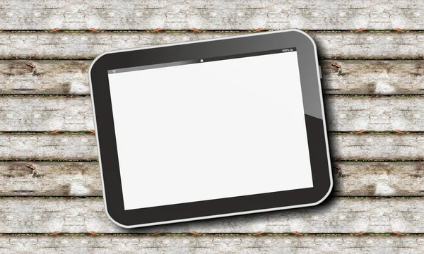 Tablet pc on weathered wood — Stock Photo, Image