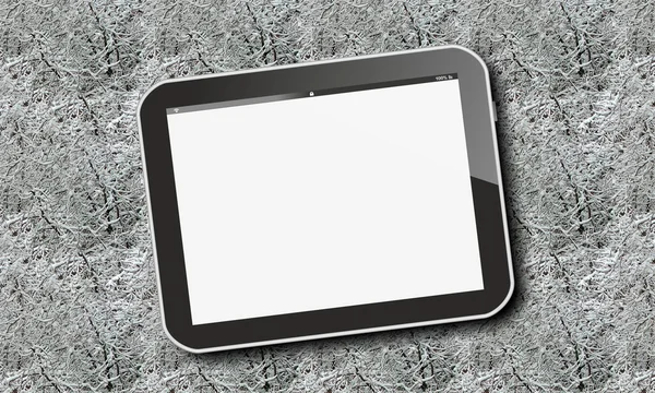 Tablet pc 的雪覆盖森林格局 — 图库照片
